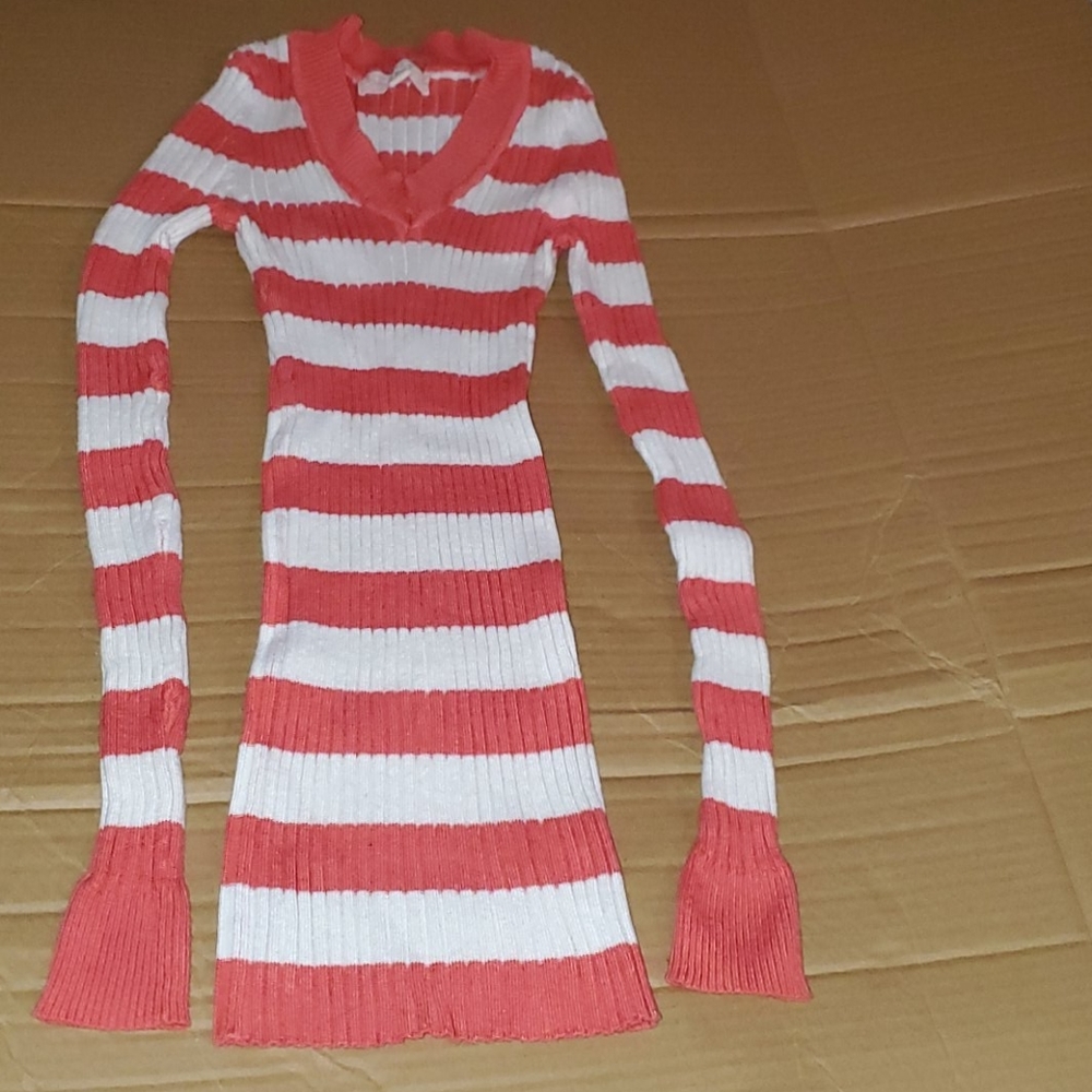 Pretty sweater to wear. Soft, stylish, and stretch